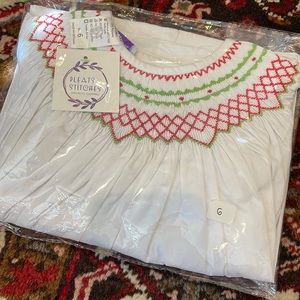 Size 6 smocked Christmas dress still in pkg